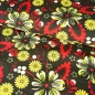 Preview: French Terry Sommersweat Gelbe Blumen / Schwarz